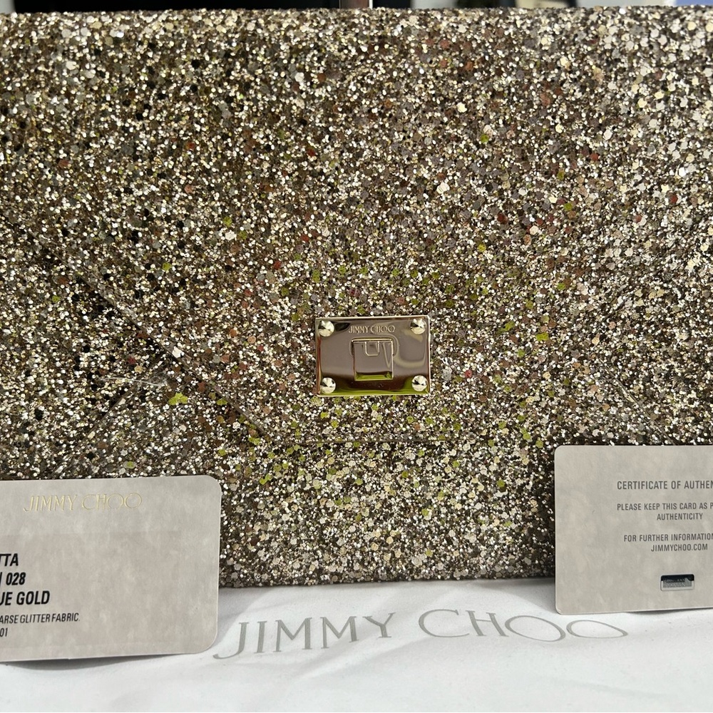 Turn Heads with this Jimmy Choo Agnes Antique Gold Clutch: